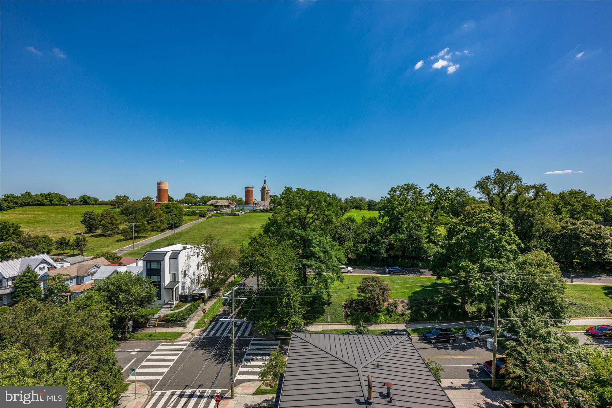 4750 41st Street Northwest, Unit 507 Washington, DC 20016 - Photo 49 of 50 a view of a house with a yard