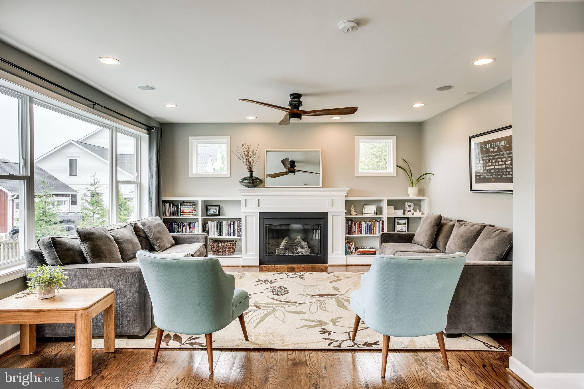 1211 Bishopsgate Way Reston, VA 20194 - Photo 20 of 56 Family room with gas fireplace & built in shelves