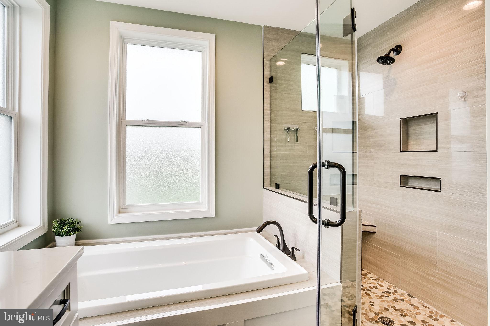 1211 Bishopsgate Way Reston, VA 20194 - Photo 29 of 56 Soaking tub and shower with double heads
