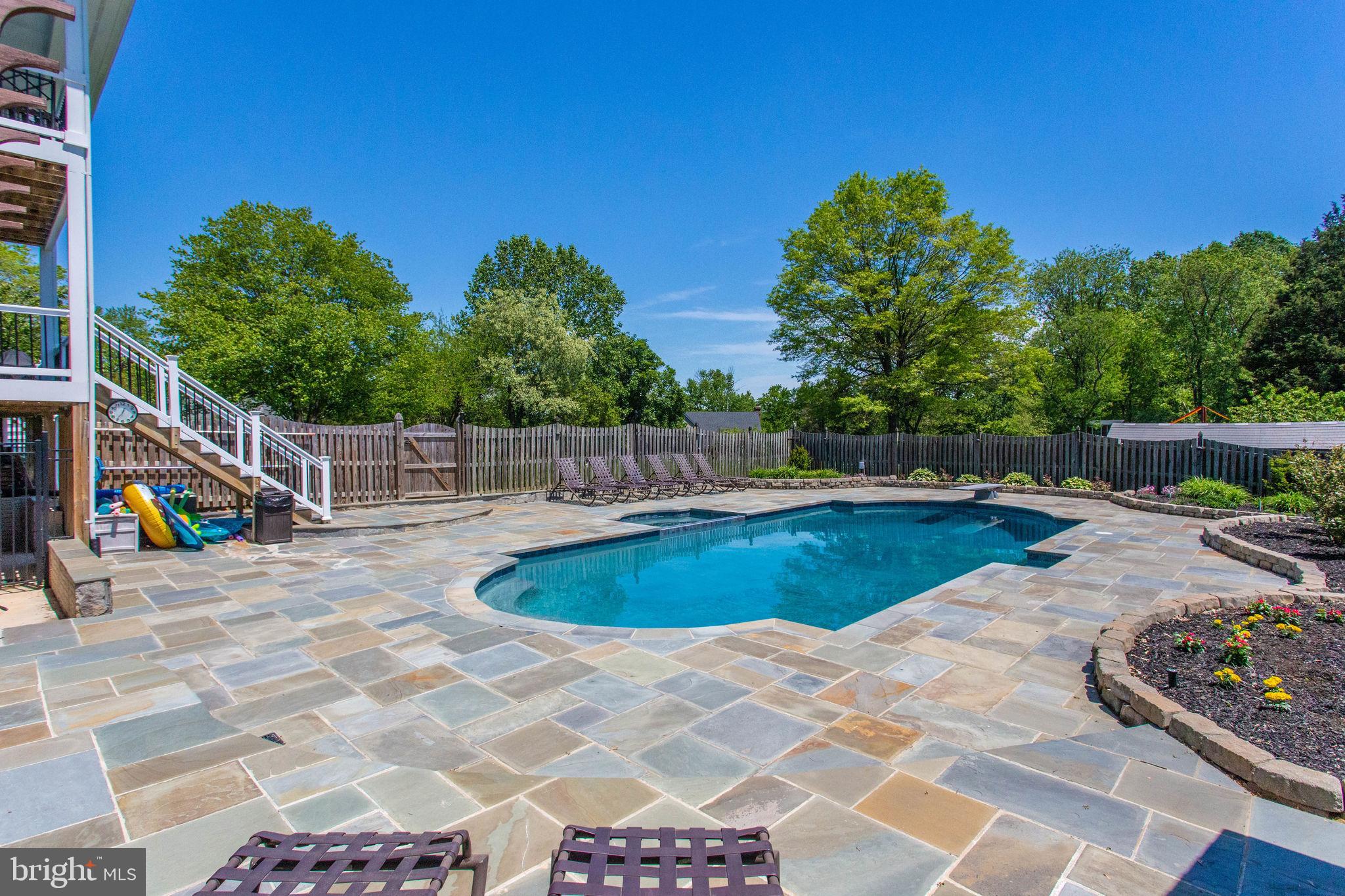 1211 Bishopsgate Way Reston, VA 20194 - Photo 4 of 56 Cool down and relax in this updated pool
