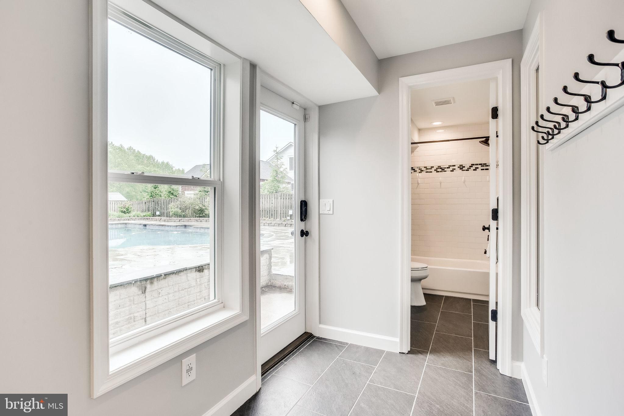 1211 Bishopsgate Way Reston, VA 20194 - Photo 37 of 56 Full lower level bathroom - easy access from pool