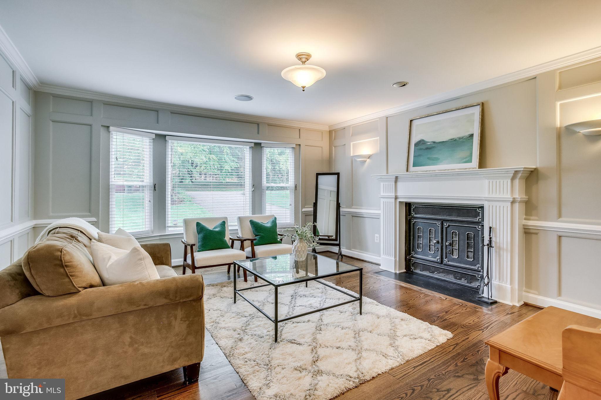 1211 Bishopsgate Way Reston, VA 20194 - Photo 7 of 56 Light filled living room w/bay window & wood stove