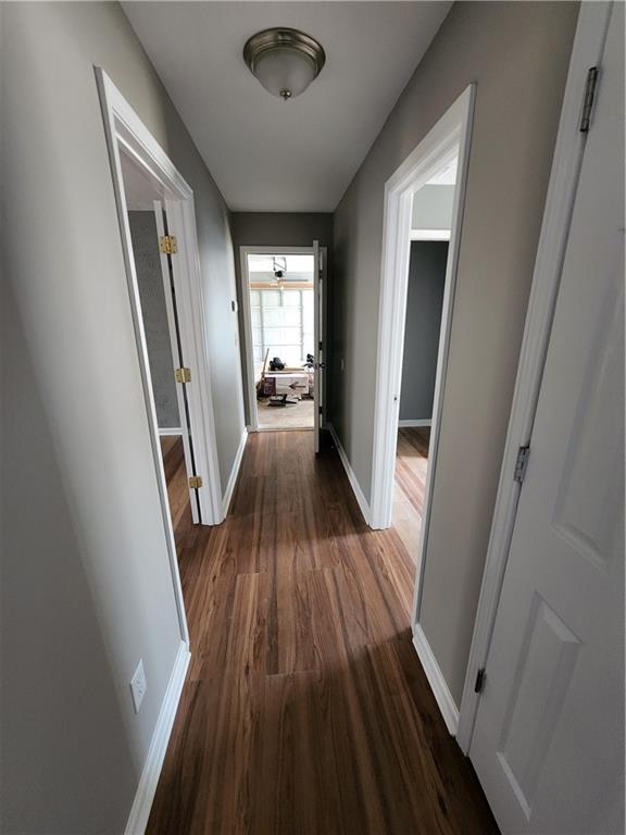 300 Overland Trail Temple, GA 30179 - Photo 17 of 35 a view of a hallway view with wooden floor and staircase