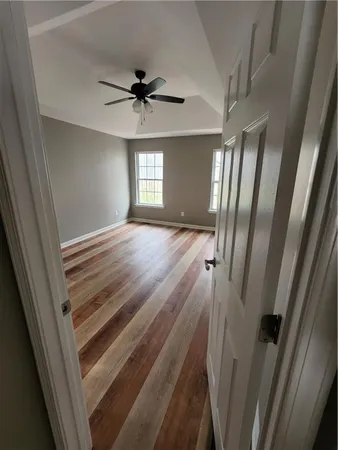 a view of entryway with wooden floor