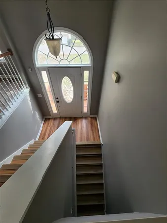 a view of outdoor space with wooden floor
