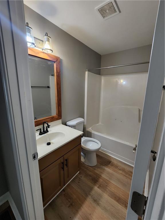 300 Overland Trail Temple, GA 30179 - Photo 27 of 35 a bathroom with a toilet sink and mirror