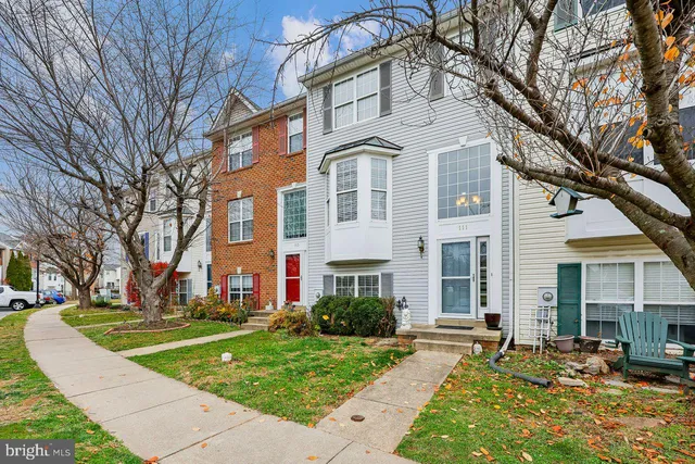 a front view of a building with garden