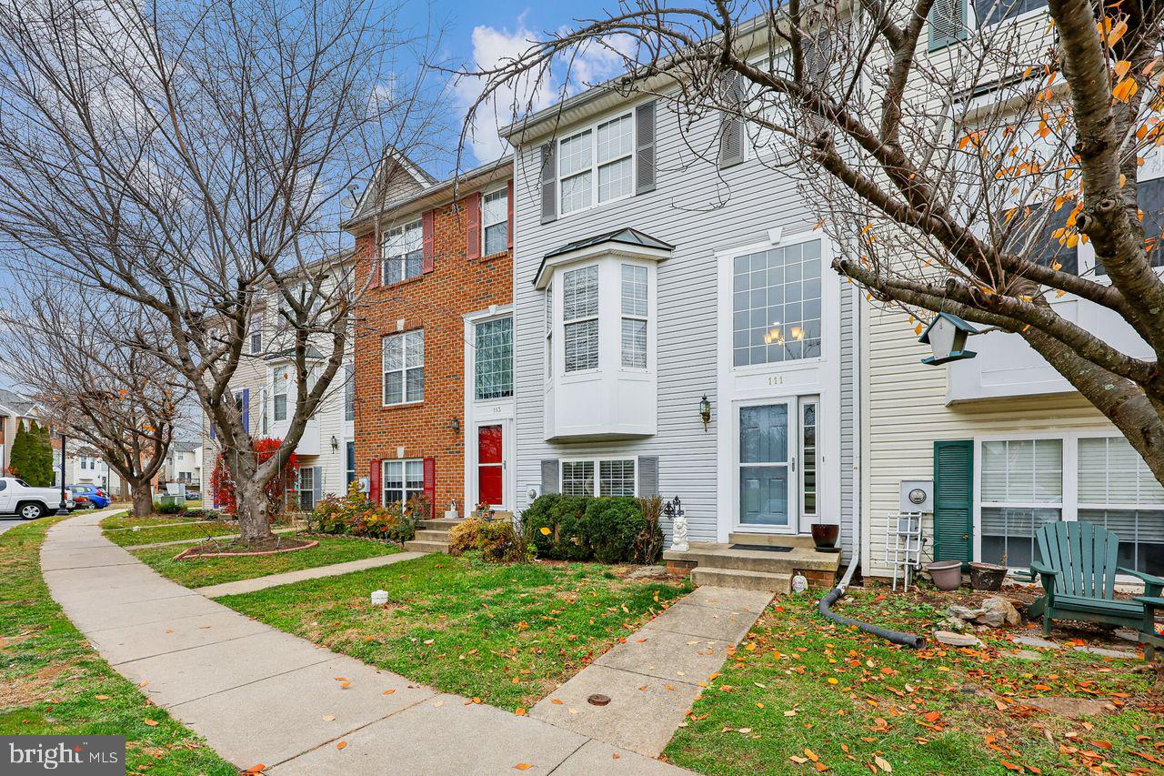 a front view of a building with garden