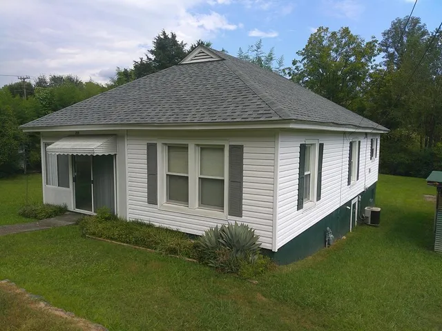 a house view with a garden space