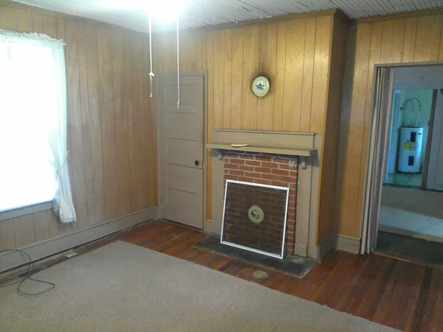 a view of a livingroom with a fireplace