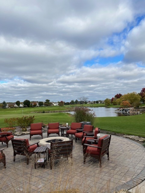 12242 Quail Ridge Drive Huntley, IL 60142 - Photo 11 of 13 a view of lake with outdoor seating