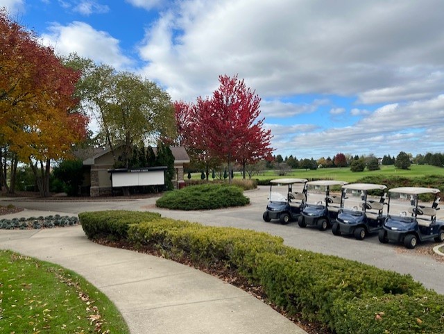 12242 Quail Ridge Drive Huntley, IL 60142 - Photo 12 of 13 a view of a house with a garden and pathway
