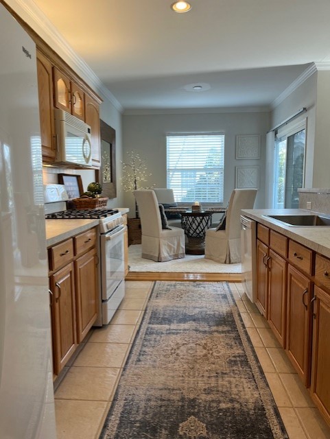 12242 Quail Ridge Drive Huntley, IL 60142 - Photo 3 of 13 a large kitchen with stainless steel appliances granite countertop a stove a sink dishwasher and cabinets