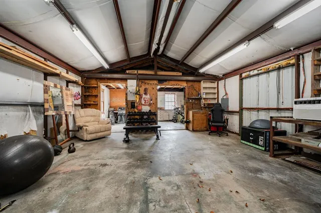 a view of a garage with furniture