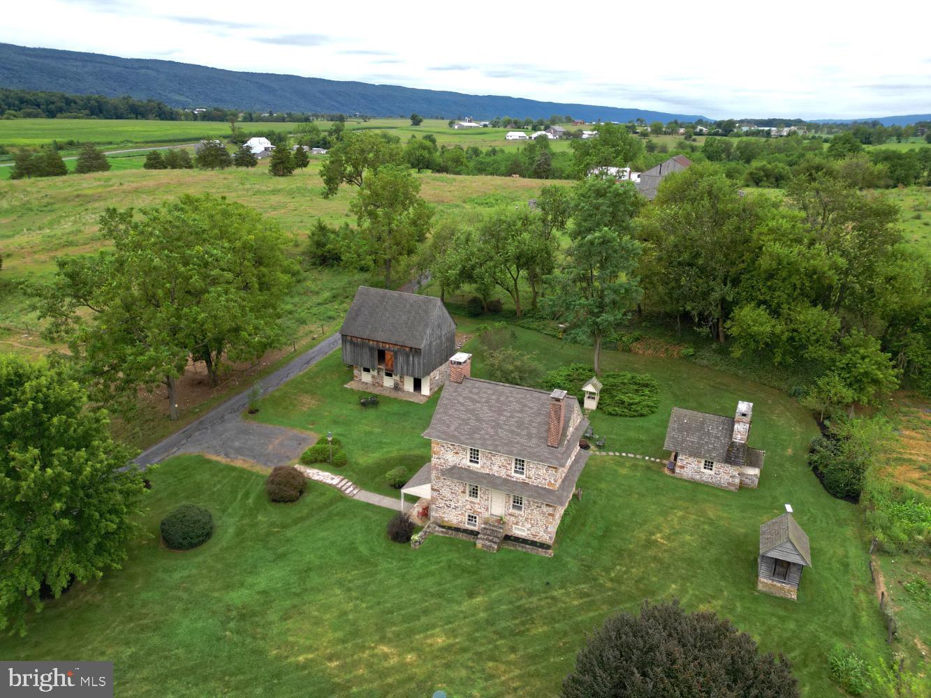 784 Coffee Run Road Reedsville, PA 17084 - Photo 2 of 48 an aerial view of a house with outdoor space swimming pool