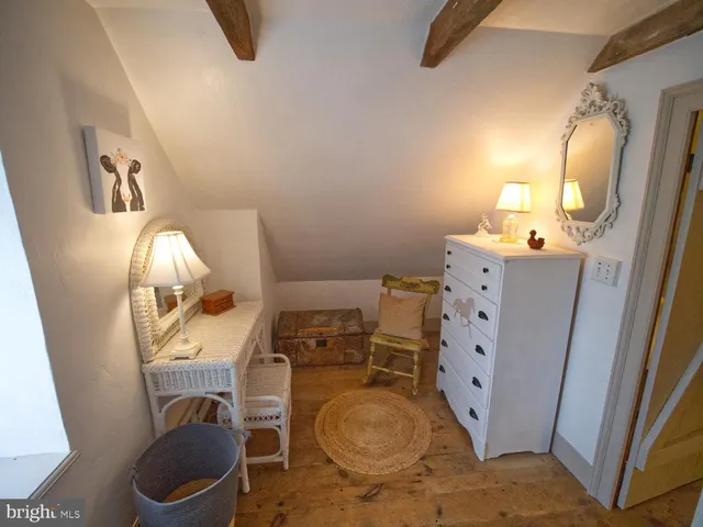 a bathroom with a sink toilet and mirror