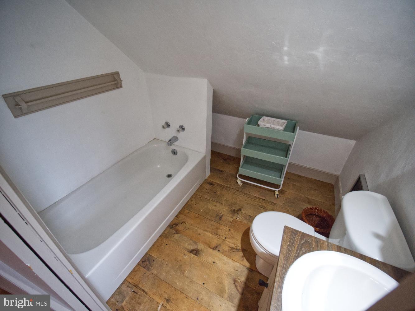 784 Coffee Run Road Reedsville, PA 17084 - Photo 24 of 48 a bathroom with a toilet sink and bathtub