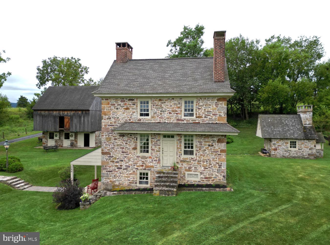 784 Coffee Run Road Reedsville, PA 17084 - Photo 3 of 48 a view of a house with a yard porch and sitting area