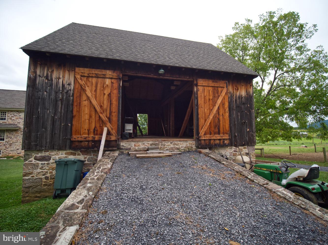 784 Coffee Run Road Reedsville, PA 17084 - Photo 35 of 48 a view of a house with backyard and garden