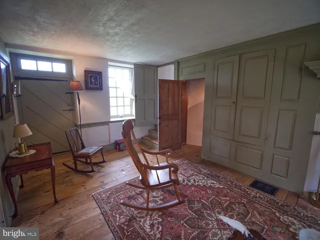 a view of a livingroom with furniture