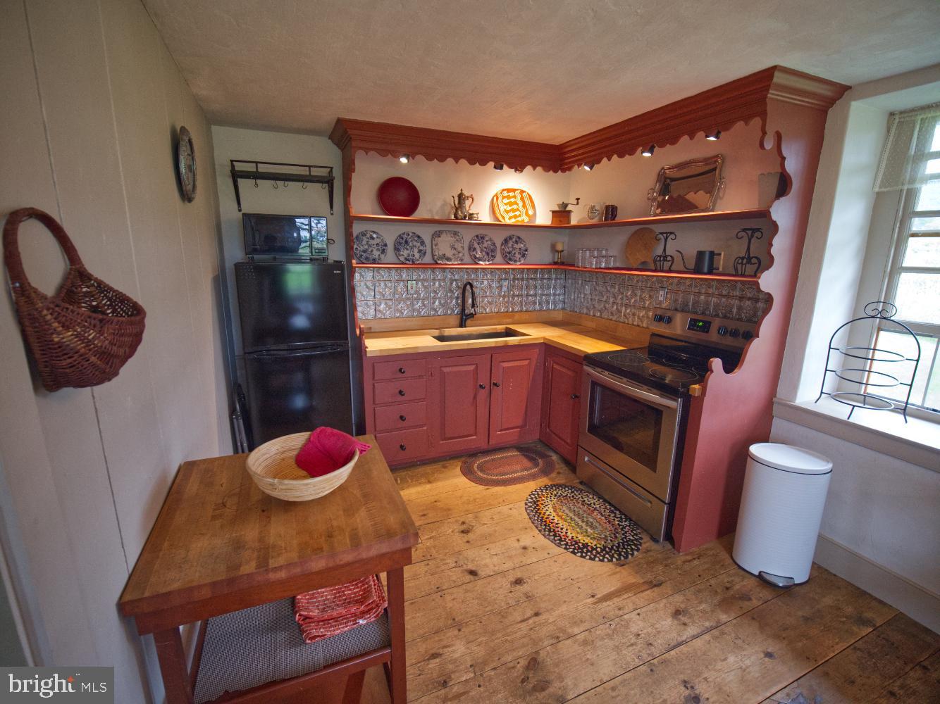 784 Coffee Run Road Reedsville, PA 17084 - Photo 10 of 48 a bathroom with a sink and a mirror