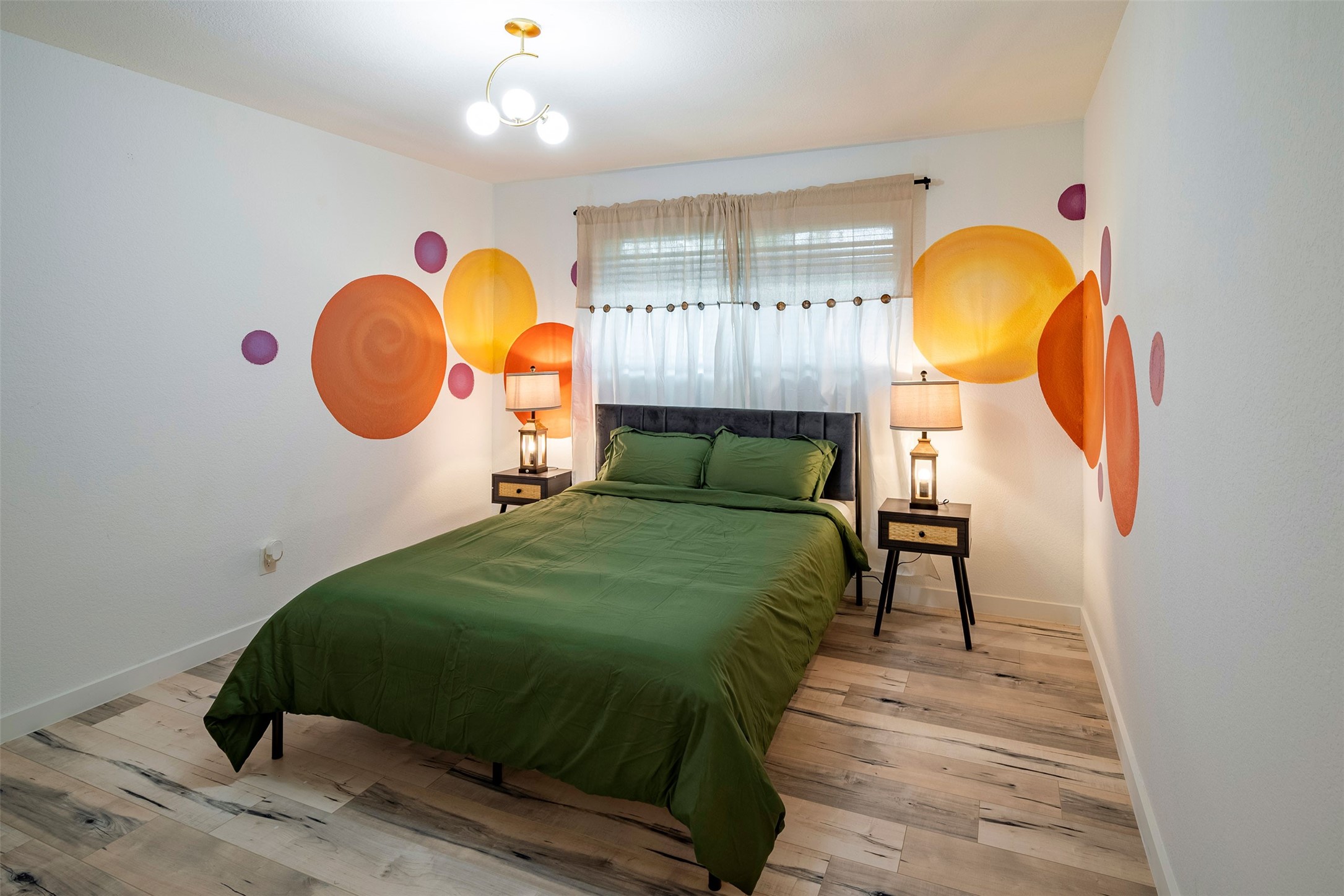 5918 Lattimer Drive Houston, TX 77035 - Photo 15 of 35 a bed room with a bed and painting on the wall