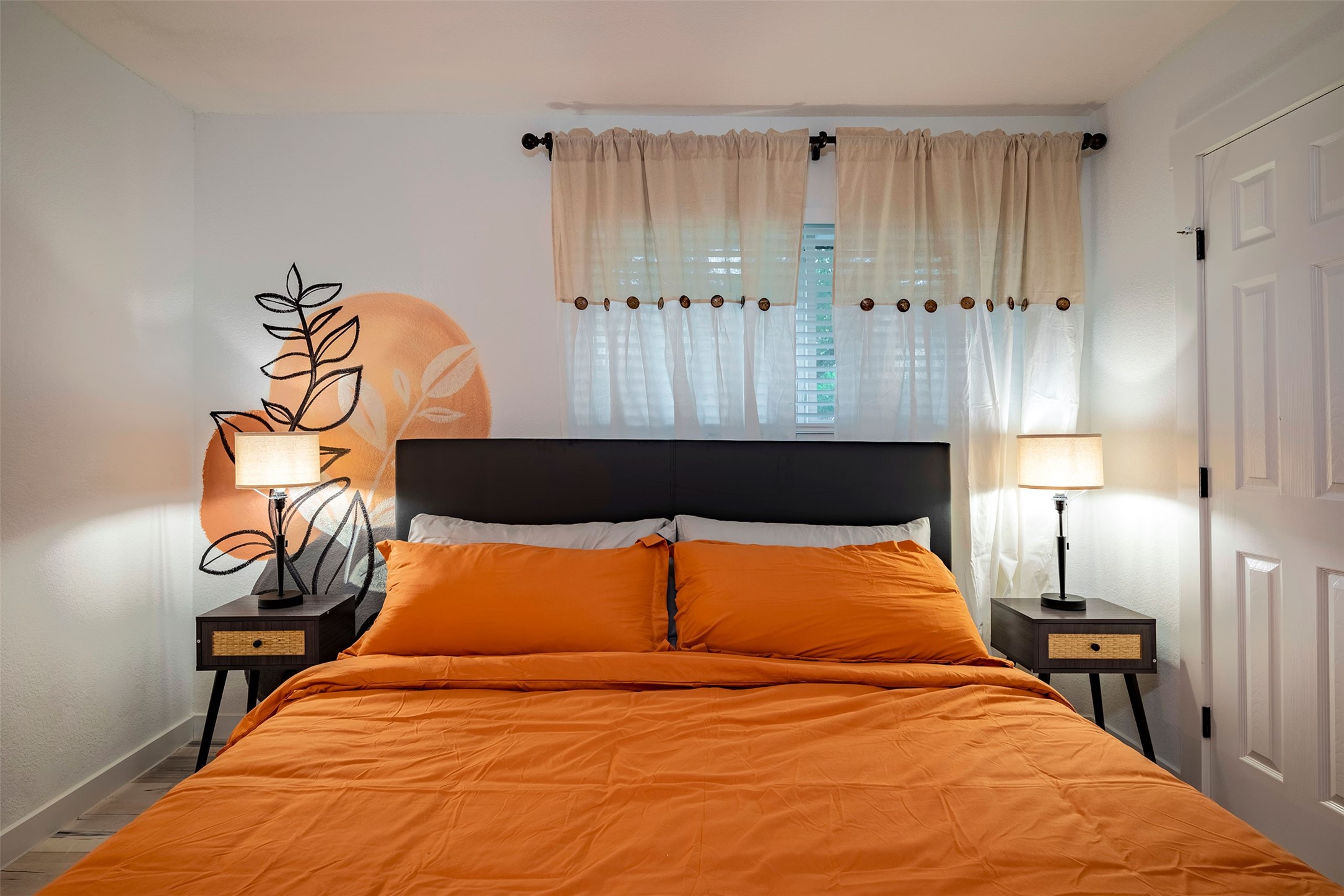 5918 Lattimer Drive Houston, TX 77035 - Photo 17 of 35 a bedroom with a bed and lamps