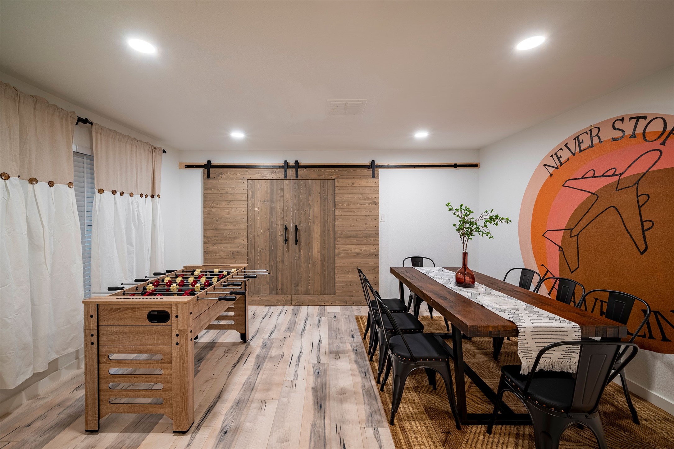 5918 Lattimer Drive Houston, TX 77035 - Photo 20 of 35 a dining room with furniture and wooden floor