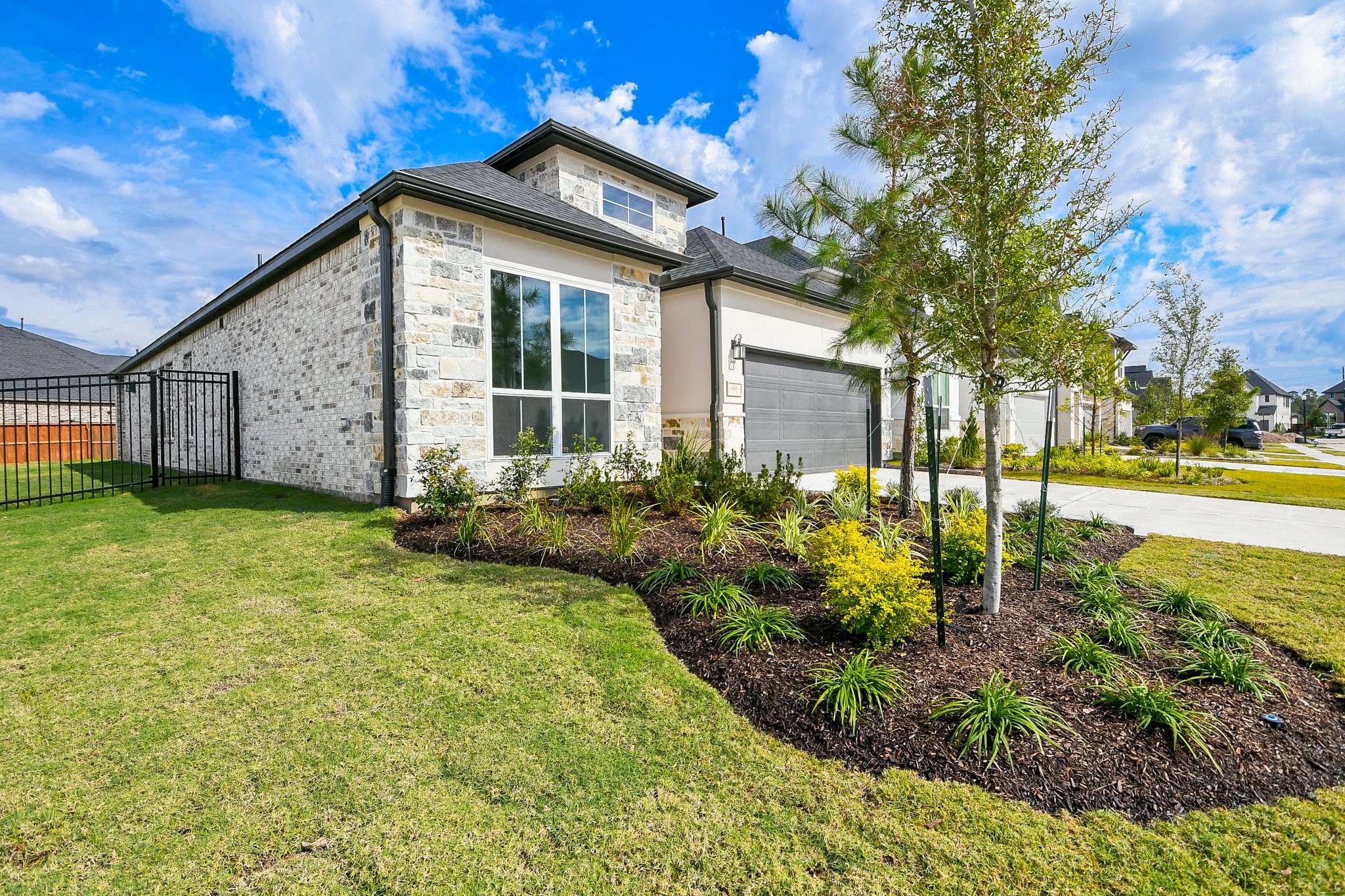5005 Vly Wind Court Spring, TX 77386 - Photo 1 of 20 a view of a house with backyard and garden