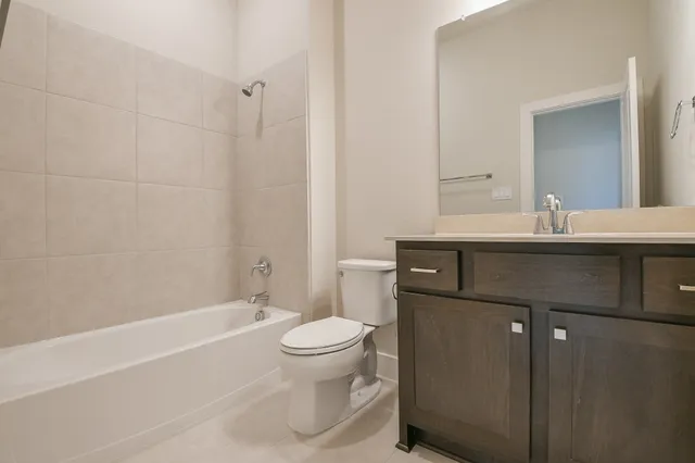 a view of kitchen with cabinets and wooden floor