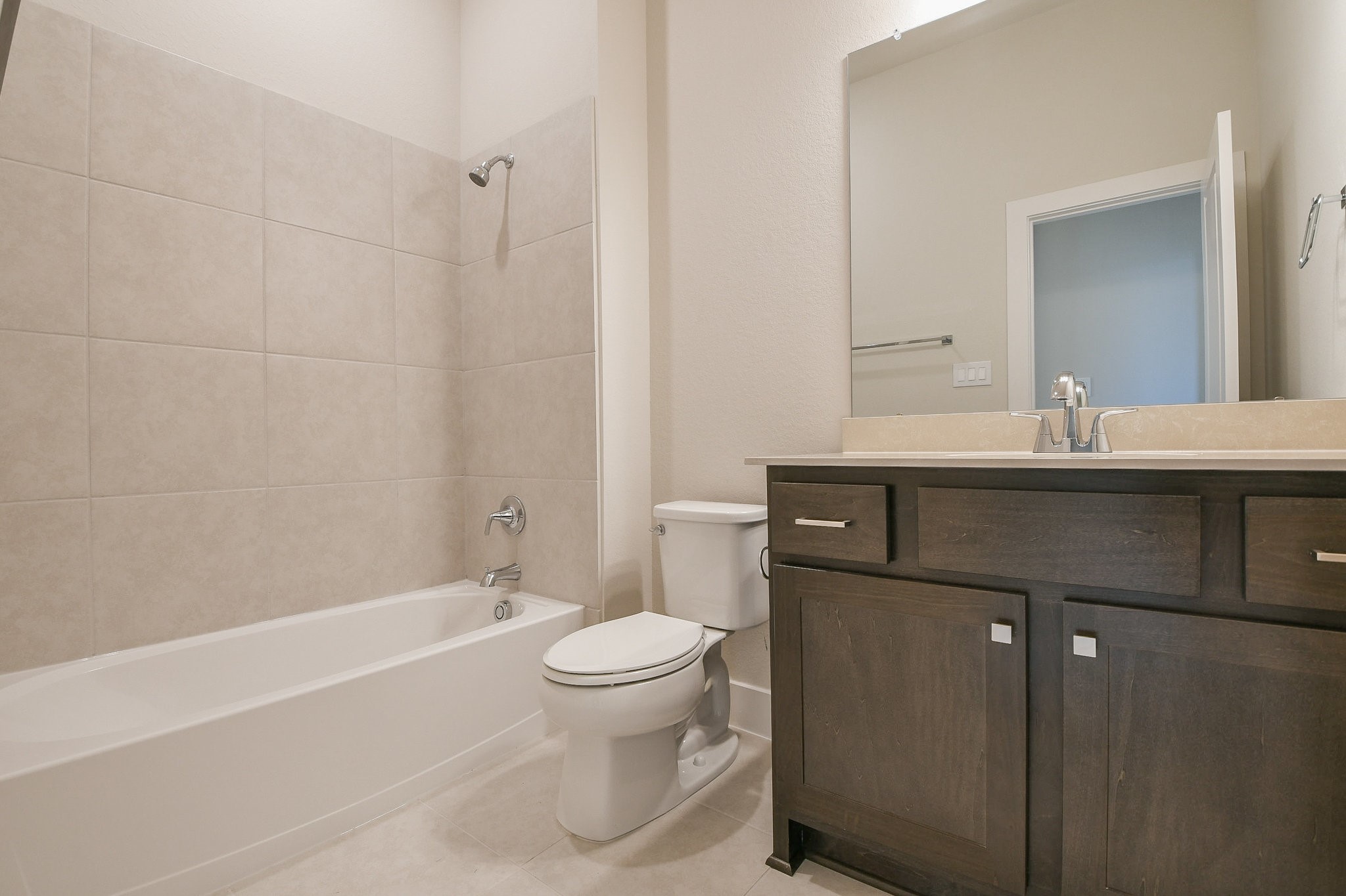 5005 Vly Wind Court Spring, TX 77386 - Photo 16 of 20 a bathroom with a sink a toilet and shower