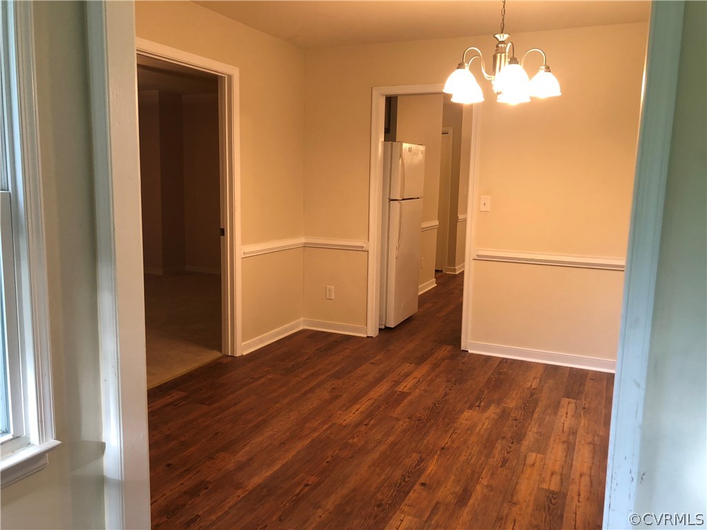 10332 Spring Run Road Chesterfield, VA 23832 - Photo 11 of 18 wooden floor in an empty room with a window