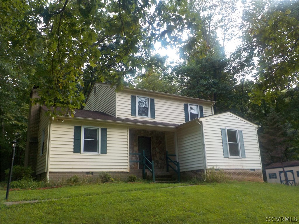 10332 Spring Run Road Chesterfield, VA 23832 - Photo 3 of 18 a front view of a house with a garden
