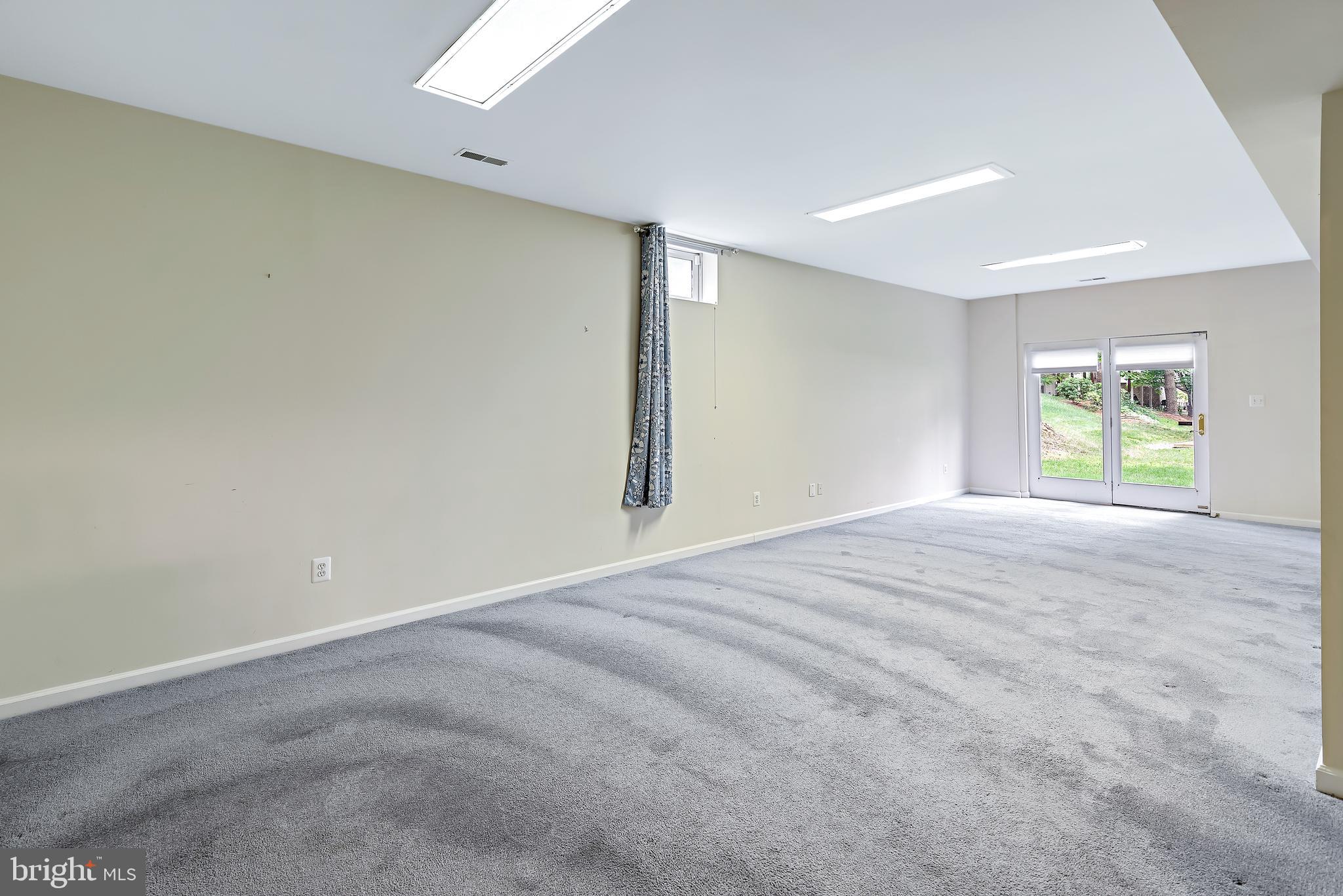 22202 Overview Lane Boyds, MD 20841 - Photo 26 of 43 Finished Walkout Basement