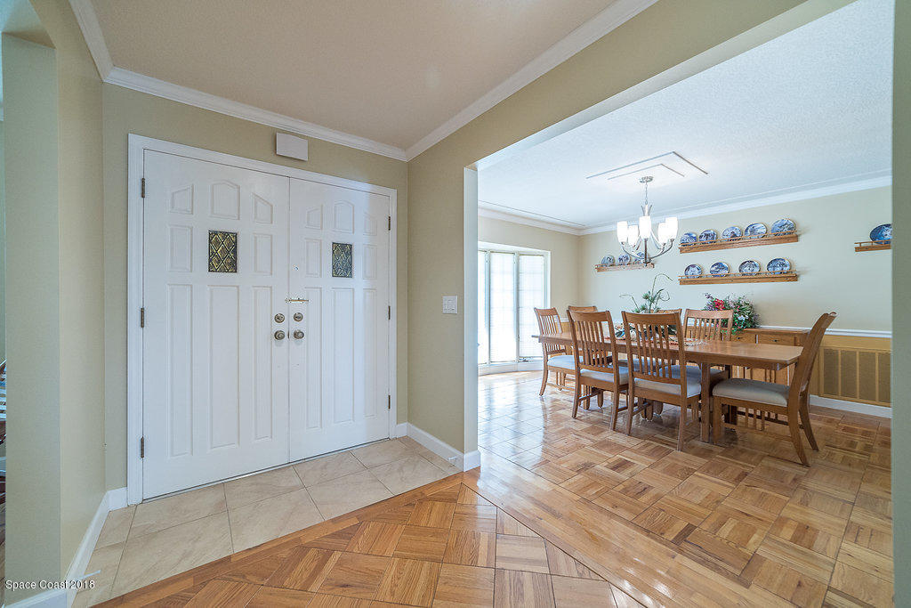 1401 Meadowbrook Road Northeast Palm Bay, FL 32905 - Photo 27 of 46 a view of a dining area with furniture