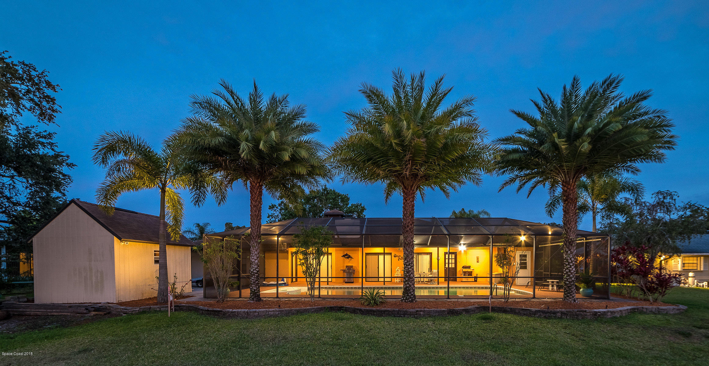 1401 Meadowbrook Road Northeast Palm Bay, FL 32905 - Photo 42 of 46 a view of outdoor space with palm trees