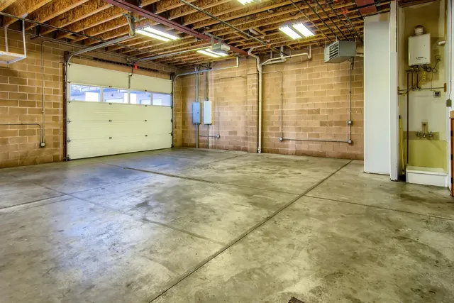 a view of a room with wooden walls