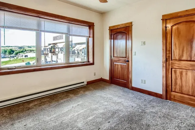 an empty room with windows