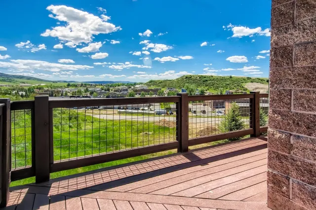 a view of a balcony with a garden