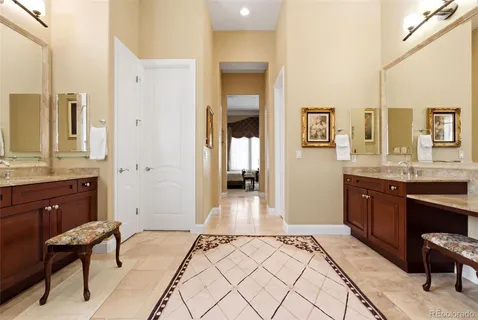 a bedroom with a bed and a dresser in it