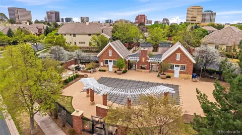 a view of multiple houses with yard