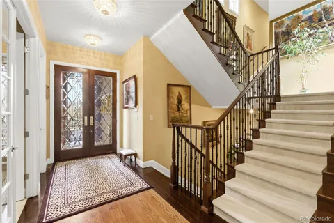 a view of an entryway with a front door