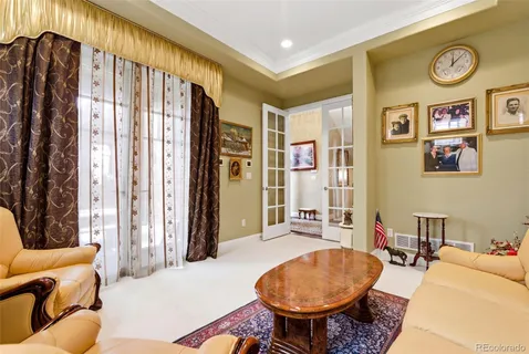 a living room with furniture and a table