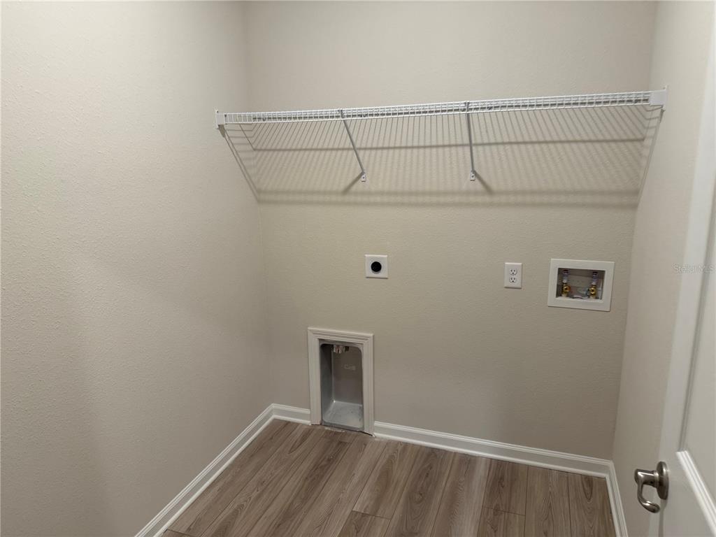 9 Pier Lane Palm Coast, FL 32164 - Photo 11 of 17 a view of small space with racks on the wall