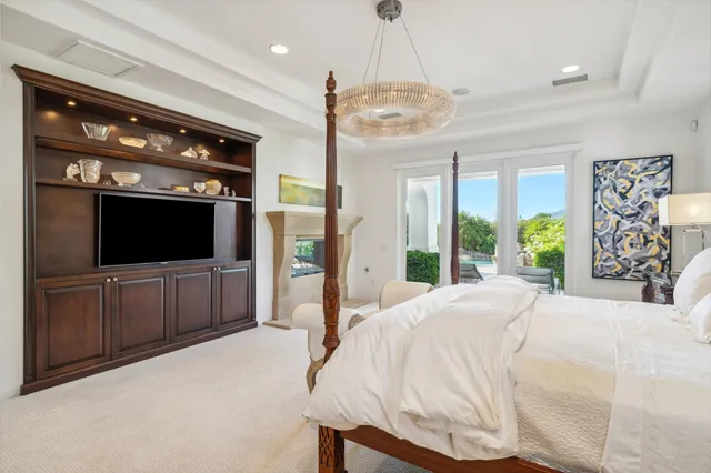 a bathroom with a double vanity sink toilet and shower