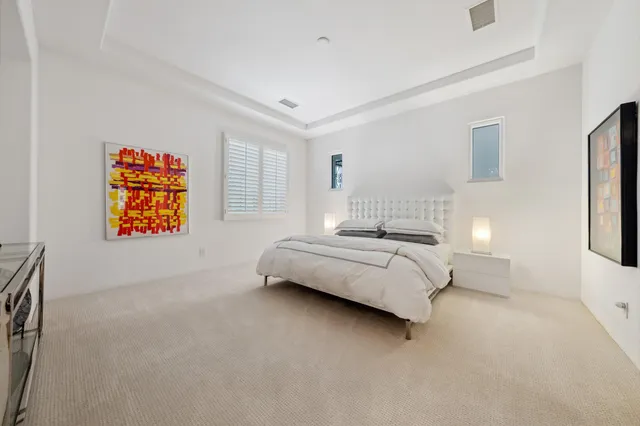 a view of balcony with chairs and a table