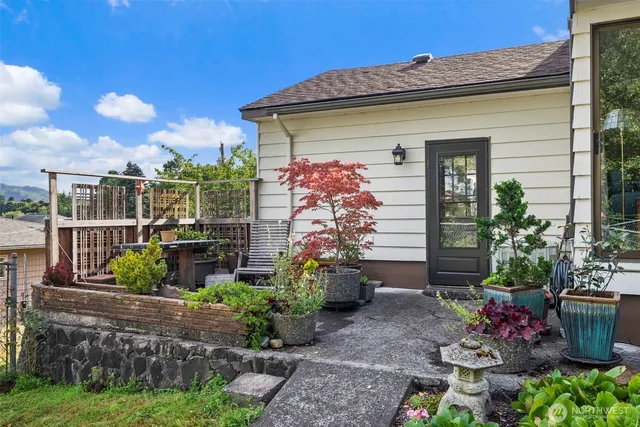 a view of a chairs and table in a patio