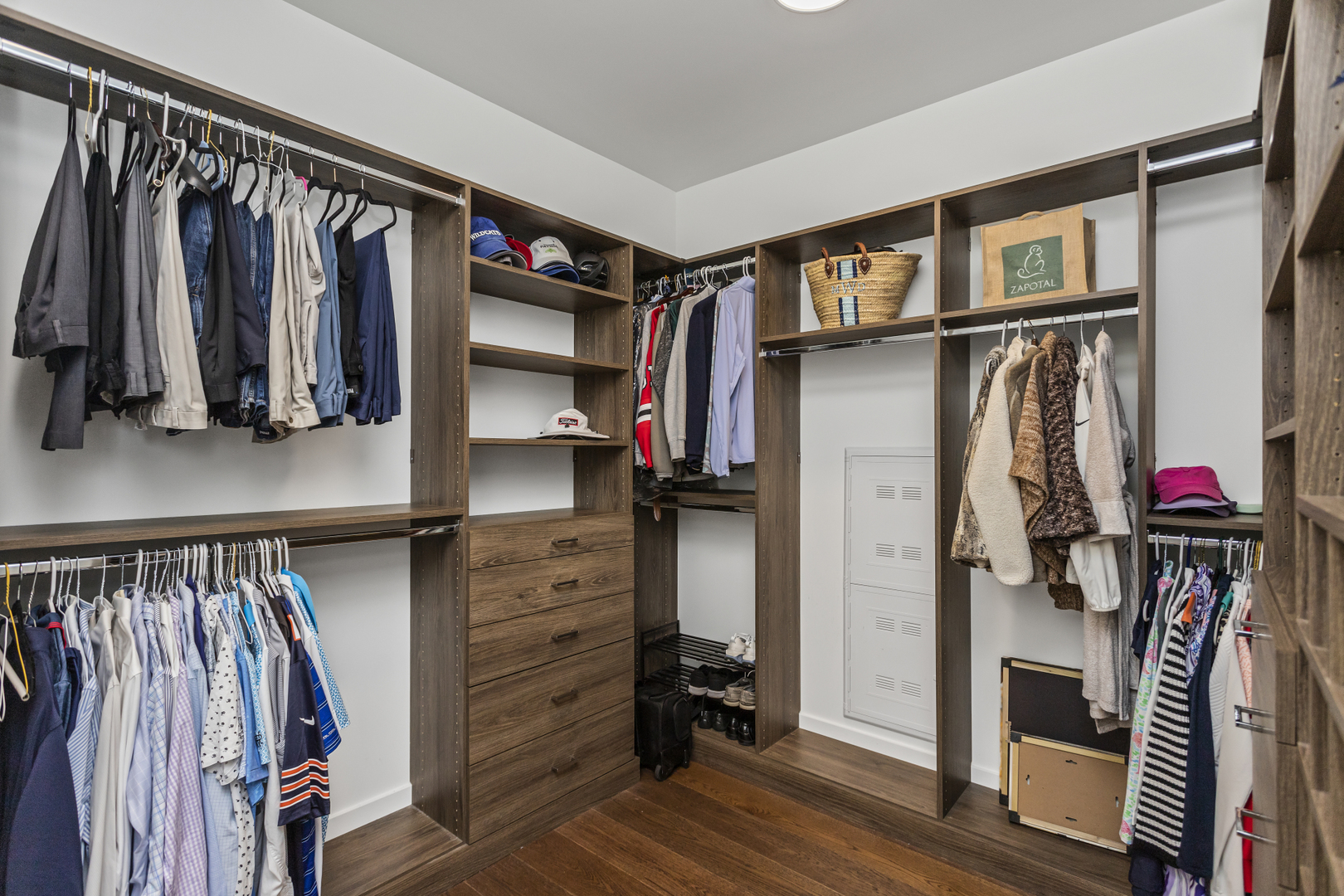 363 East Wacker Drive, Unit 2503 Chicago, IL 60601 - Photo 13 of 52 a view of walk in closet with clothes and shoes