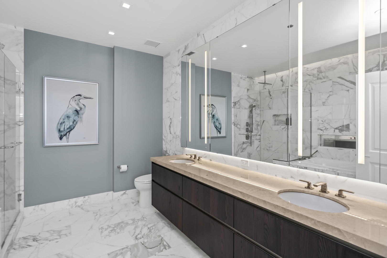 363 East Wacker Drive, Unit 2503 Chicago, IL 60601 - Photo 16 of 52 a bathroom with a double vanity sink mirror and double