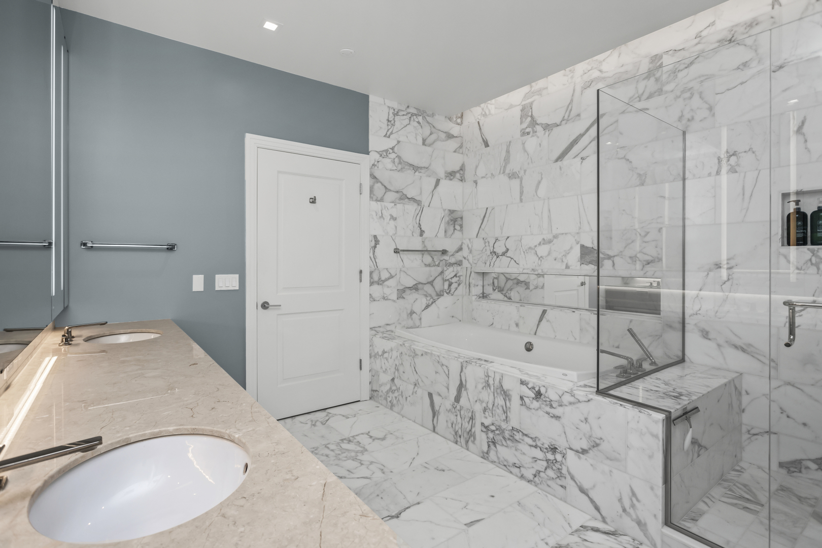 363 East Wacker Drive, Unit 2503 Chicago, IL 60601 - Photo 17 of 52 a bathroom with a sink and a mirror